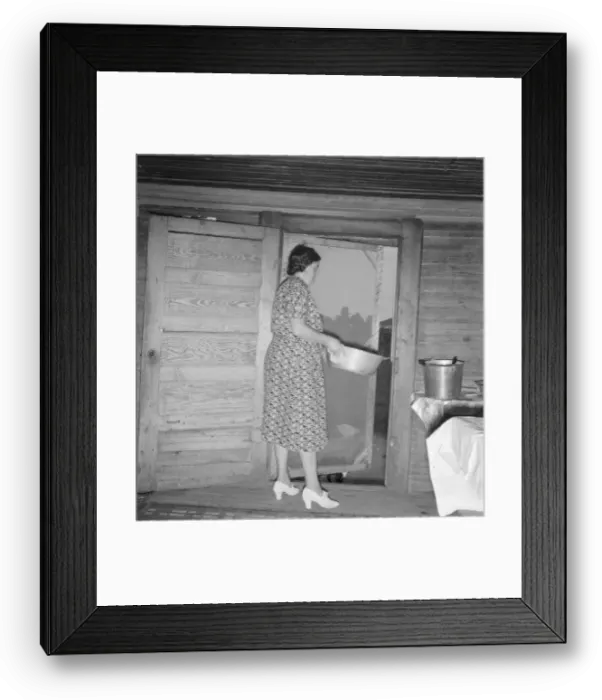 Framed Print : Tobacco sharecroppers wife disposing of dishwater... Person County, North Carolina, 1939. Creator: Dorothea Lange Framed Print : Tobacco sharecroppers wife disposing of dishwater... Person County, North Carolina, 1939. Creator: Dorothea Lange