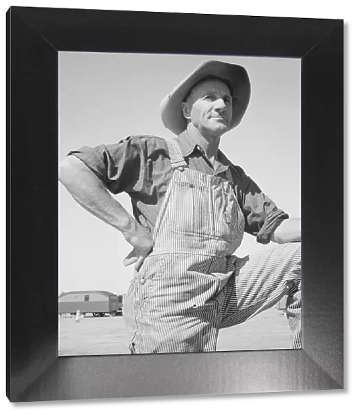 Farmer from Nebraska in emergency camp for migratory work... Calipatria, Imperial County, CA, 1939. Creator: Dorothea Lange