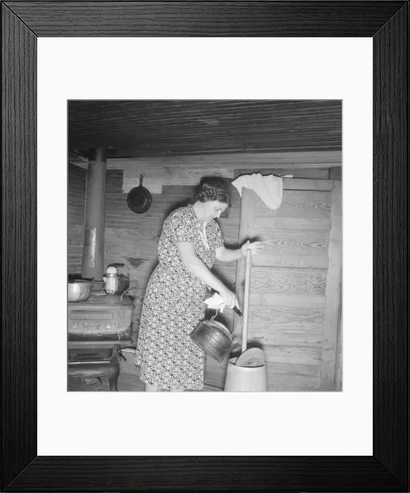 Framed Print : Wife of tobacco sharecropper cleaning butter churn, Person County, North Carolina, 1939. Creator: Dorothea Lange Framed Print : Wife of tobacco sharecropper cleaning butter churn, Person County, North Carolina, 1939. Creator: Dorothea Lange