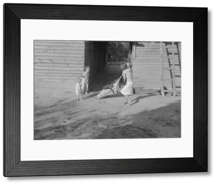 Framed Print : Burroughs children playing in the yard, Hale County, Alabama, 1936. Creator: Walker Evans Framed Print : Burroughs children playing in the yard, Hale County, Alabama, 1936. Creator: Walker Evans
