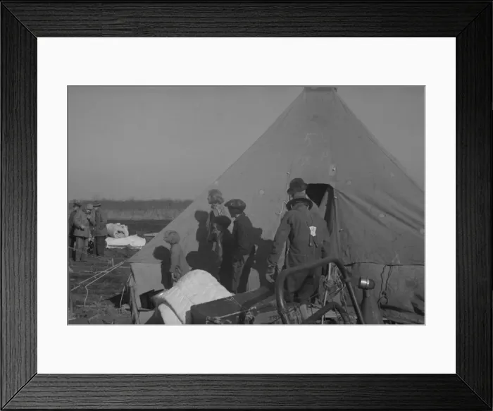 Framed Print : Possibly: Setting up a tent in the camp for white flood refugees, Forrest City, Arkansas, 1937. Creator: Walker Evans Framed Print : Possibly: Setting up a tent in the camp for white flood refugees, Forrest City, Arkansas, 1937. Creator: Walker Evans