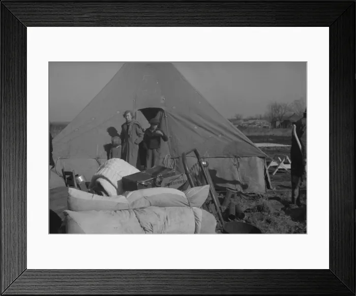Framed Print : Setting up a tent in the camp for white flood refugees, Forrest City, Arkansas, 1937. Creator: Walker Evans Framed Print : Setting up a tent in the camp for white flood refugees, Forrest City, Arkansas, 1937. Creator: Walker Evans
