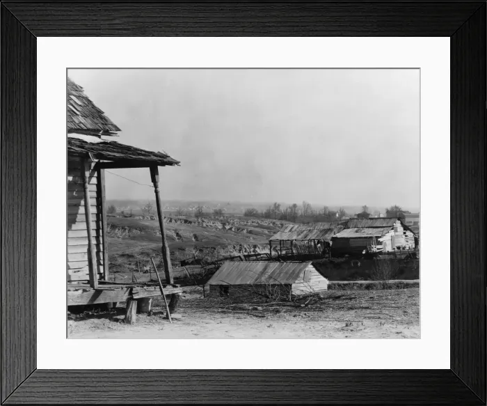 Framed Print : New outskirts of town, showing Negro houses and soil erosion, Tupelo, Mississippi, 1936. Creator: Walker Evans Framed Print : New outskirts of town, showing Negro houses and soil erosion, Tupelo, Mississippi, 1936. Creator: Walker Evans