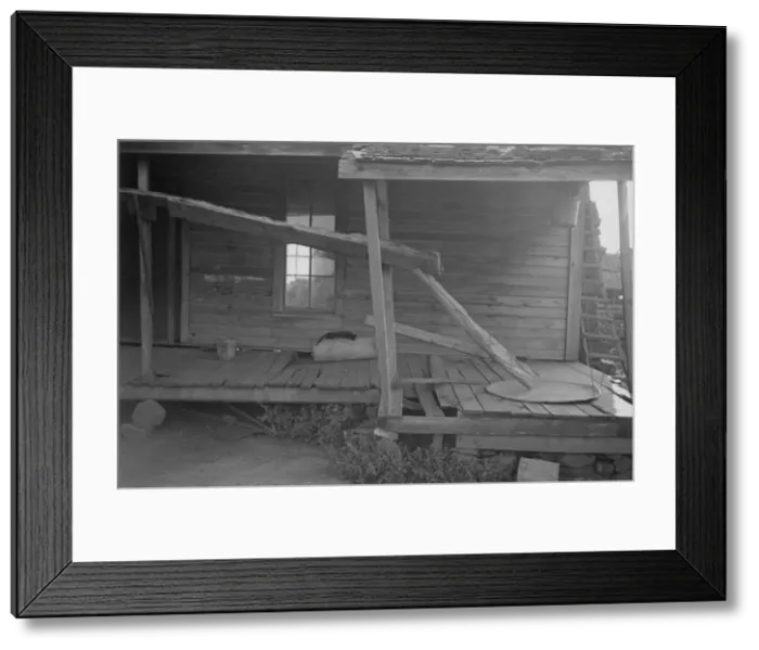 Framed Print : Porch of a sharecroppers cabin, Hale County, Alabama, 1936. Creator: Walker Evans Framed Print : Porch of a sharecroppers cabin, Hale County, Alabama, 1936. Creator: Walker Evans