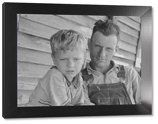 Charles and his father Floyd Burroughs, Alabama cotton sharecropper, 1936. Creator: Walker Evans