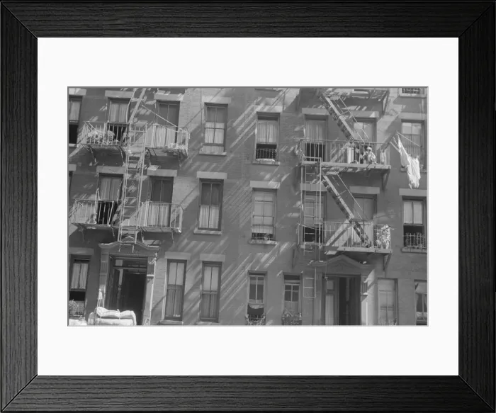 Framed Print : House fronts, 61st Street between 1st and 3rd Avenues, New York, 1938. Creator: Walker Evans Framed Print : House fronts, 61st Street between 1st and 3rd Avenues, New York, 1938. Creator: Walker Evans