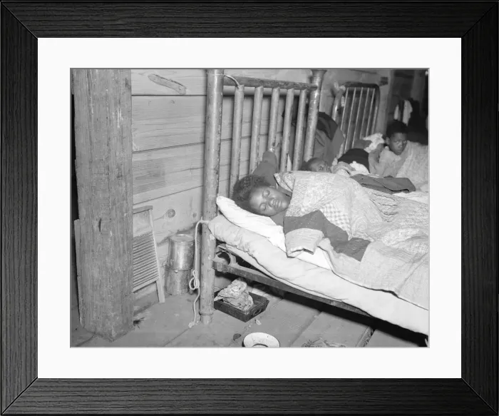 Framed Print : Sick flood refugee in the Red Cross temporary infirmary at Forrest City, Arkansas, 1937. Creator: Walker Evans Framed Print : Sick flood refugee in the Red Cross temporary infirmary at Forrest City, Arkansas, 1937. Creator: Walker Evans