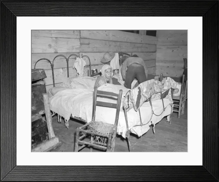 Framed Print : Sick Negro in the Red Cross temporary infirmary for flood refugees, Forrest City, Arkansas, 1937. Creator: Walker Evans Framed Print : Sick Negro in the Red Cross temporary infirmary for flood refugees, Forrest City, Arkansas, 1937. Creator: Walker Evans