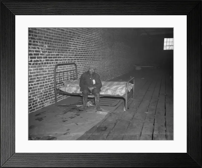 Framed Print : Negro flood refugee in the Red Cross temporary infirmary of Forrest City, Arkansas, 1937. Creator: Walker Evans Framed Print : Negro flood refugee in the Red Cross temporary infirmary of Forrest City, Arkansas, 1937. Creator: Walker Evans