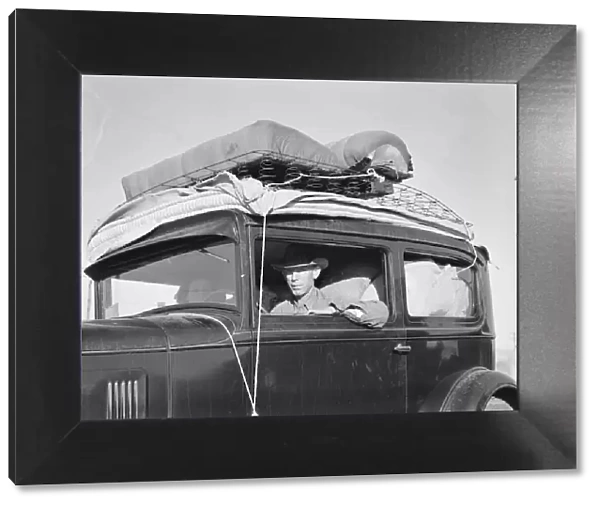 Migratory cotton picker from Kansas on highway near Merced, California, 1939. Creator: Dorothea Lange