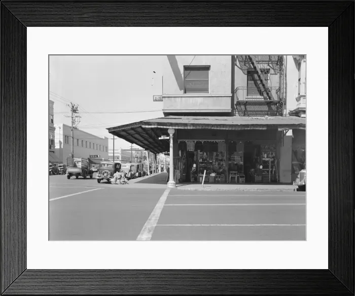 Framed Print : Street corner of San Joaquin Valley town on U. S. 99 showing secondhand store, Fresno, CA, 1939. Creator: Dorothea Lange Framed Print : Street corner of San Joaquin Valley town on U. S. 99 showing secondhand store, Fresno, CA, 1939. Creator: Dorothea Lange