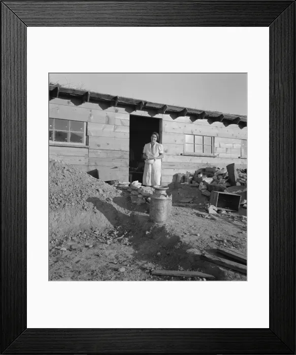 Framed Print : Mrs. Dougherty in doorway of basement house, Warm Springs, Malheur County, Oregon, 1939. Creator: Dorothea Lange Framed Print : Mrs. Dougherty in doorway of basement house, Warm Springs, Malheur County, Oregon, 1939. Creator: Dorothea Lange