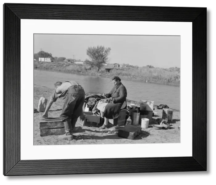Framed Print : Migrant family cleaning up, near Vale, Malheur County, Oregon, 1939. Creator: Dorothea Lange Framed Print : Migrant family cleaning up, near Vale, Malheur County, Oregon, 1939. Creator: Dorothea Lange