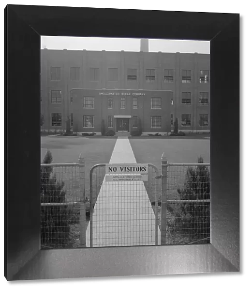 Entrance to Amalgamated Sugar Company factory at opening... Nyssa, Malheur County, Oregon, 1939. Creator: Dorothea Lange