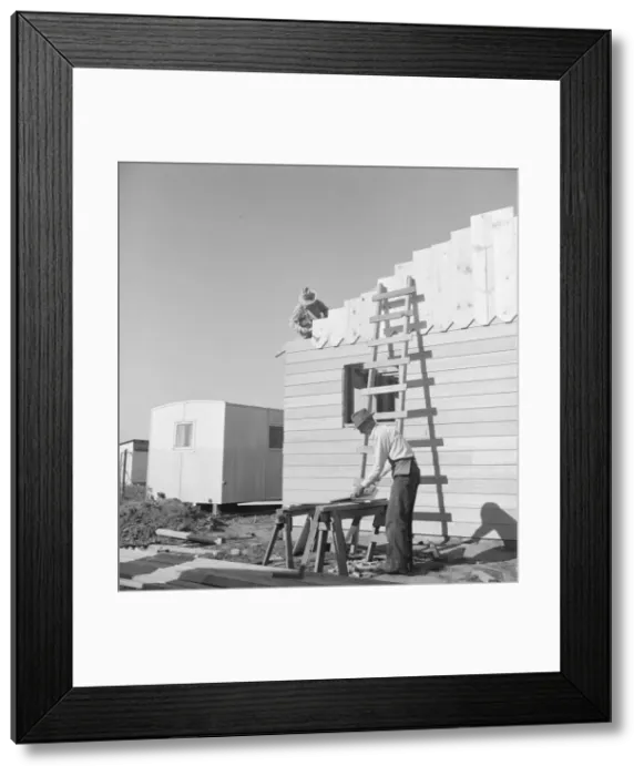 Framed Print : Father and son, recent migrants to California, building house, Salinas, California, 1939. Creator: Dorothea Lange Framed Print : Father and son, recent migrants to California, building house, Salinas, California, 1939. Creator: Dorothea Lange