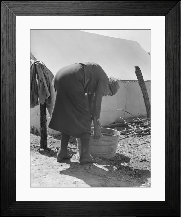 Framed Print : A grandmother washing clothes in a migrant camp, Stanislaus County, California, 1939. Creator: Dorothea Lange Framed Print : A grandmother washing clothes in a migrant camp, Stanislaus County, California, 1939. Creator: Dorothea Lange