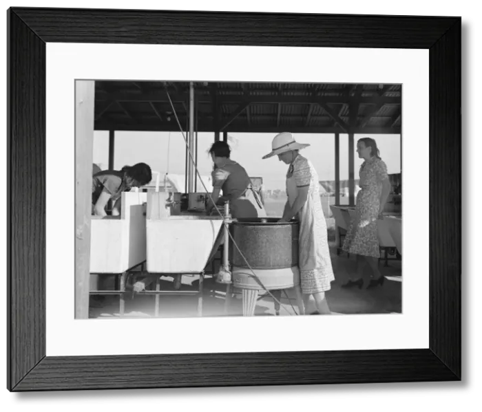 Framed Print : Laundry facilities in FSA migrant labor camp, Westley, California, 1939. Creator: Dorothea Lange Framed Print : Laundry facilities in FSA migrant labor camp, Westley, California, 1939. Creator: Dorothea Lange