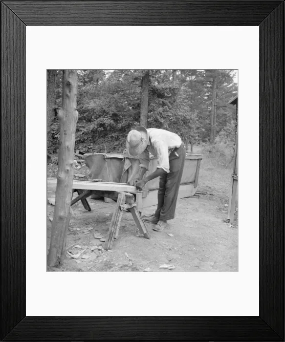 Framed Print : Zollie Lyons repairing the tobacco sleds at... harvest season, Wake County, North Carolina, 1939. Creator: Dorothea Lange Framed Print : Zollie Lyons repairing the tobacco sleds at... harvest season, Wake County, North Carolina, 1939. Creator: Dorothea Lange