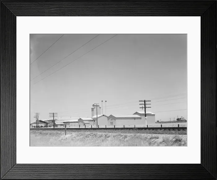 Framed Print : Winery belonging to Muscat Cooperative, on US 99. between Tulare and Fresno, California, 1939. Creator: Dorothea Lange Framed Print : Winery belonging to Muscat Cooperative, on US 99. between Tulare and Fresno, California, 1939. Creator: Dorothea Lange
