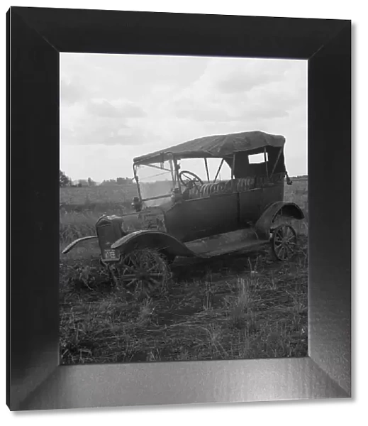 The end of the Model 'T'abandoned... along Highway 99, North of Eugene, Oregon, 1939. Creator: Dorothea Lange