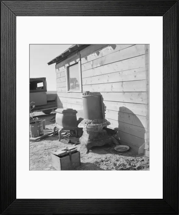 Framed Print : Stoves outside the Browning house being repaired for winter use, Dead Ox Flat, Oregon, 1939. Creator: Dorothea Lange Framed Print : Stoves outside the Browning house being repaired for winter use, Dead Ox Flat, Oregon, 1939. Creator: Dorothea Lange
