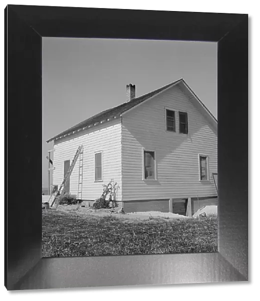Exterior of Soper house, just finished painting, Willow Creek area, Malheur County, Oregon, 1939. Creator: Dorothea Lange