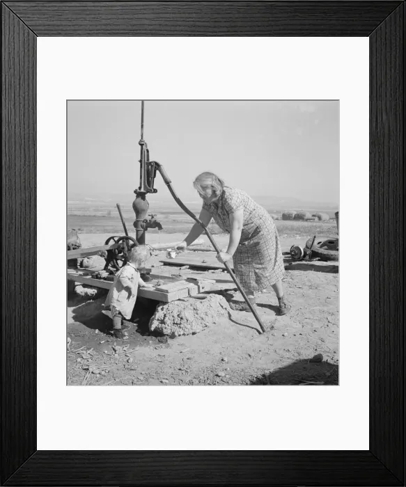 Framed Print : Mrs. Soper with youngest child at the well, Willow creek area, Malheur County, Oregon, 1939. Creator: Dorothea Lange Framed Print : Mrs. Soper with youngest child at the well, Willow creek area, Malheur County, Oregon, 1939. Creator: Dorothea Lange