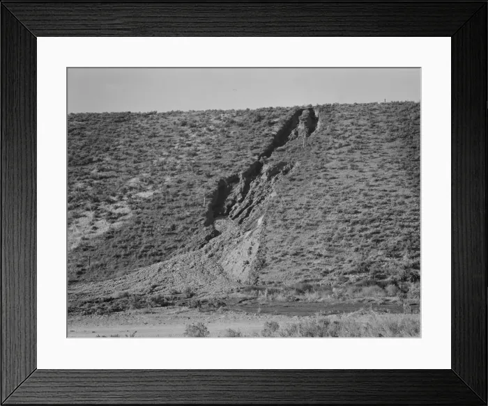 Framed Print : Water seepage from newly irrigated land on top of bench, eroding sides, Dead Ox Flat, Oregon, 1939. Creator: Dorothea Lange Framed Print : Water seepage from newly irrigated land on top of bench, eroding sides, Dead Ox Flat, Oregon, 1939. Creator: Dorothea Lange