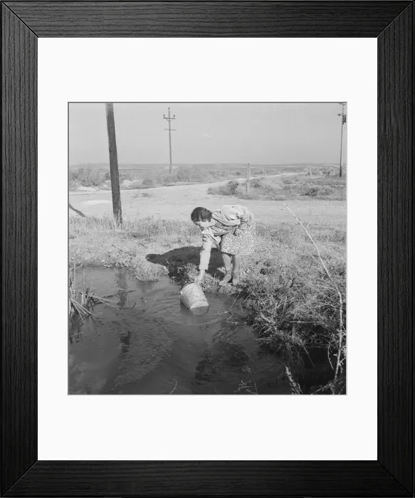 Framed Print : Mrs. Bartheloma dipping water from irrigation ditch... Nyssa Heights, Malheur County, Oregon, 1939. Creator: Dorothea Lange Framed Print : Mrs. Bartheloma dipping water from irrigation ditch... Nyssa Heights, Malheur County, Oregon, 1939. Creator: Dorothea Lange