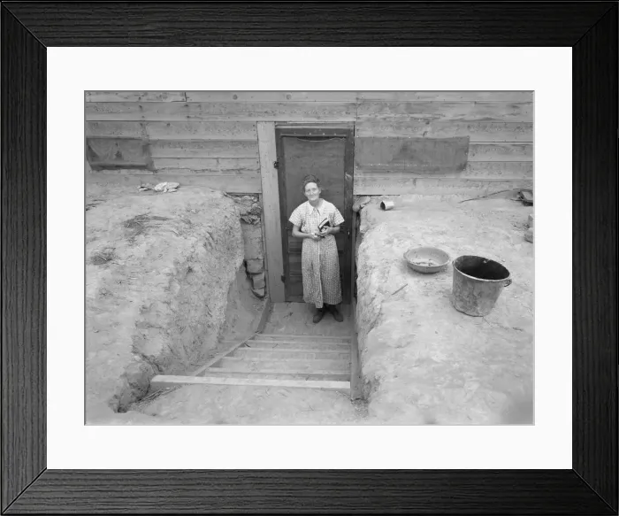 Framed Print : Mrs. Free in doorway of her basement dugout home, Dead Ox Flat, Oregon, 1939. Creator: Dorothea Lange Framed Print : Mrs. Free in doorway of her basement dugout home, Dead Ox Flat, Oregon, 1939. Creator: Dorothea Lange