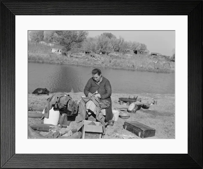 Framed Print : Mother of migrant family sewing, near Vale, Malheur County, Oregon, 1939. Creator: Dorothea Lange Framed Print : Mother of migrant family sewing, near Vale, Malheur County, Oregon, 1939. Creator: Dorothea Lange