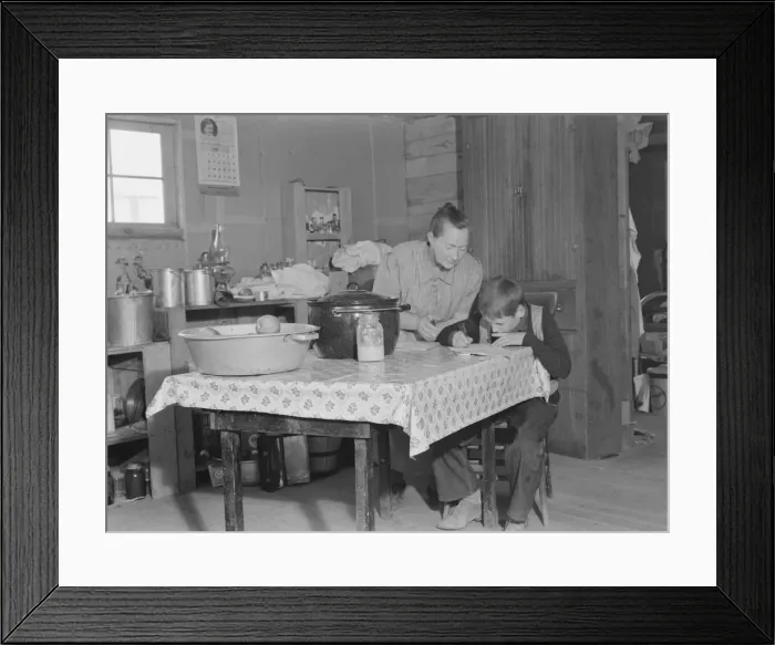 Framed Print : The youngest Wardlow boy copies out a recipe for his mother, Dead Ox Flat, Oregon, 1939. Creator: Dorothea Lange Framed Print : The youngest Wardlow boy copies out a recipe for his mother, Dead Ox Flat, Oregon, 1939. Creator: Dorothea Lange