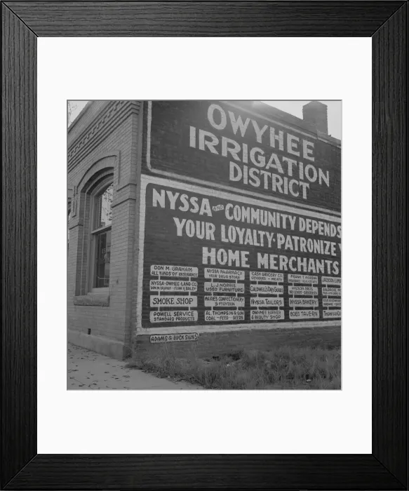 Framed Print : Sign on old bank building which now houses office of Bureau... Nyssa, Malheur County, Oregon, 1939. Creator: Dorothea Lange Framed Print : Sign on old bank building which now houses office of Bureau... Nyssa, Malheur County, Oregon, 1939. Creator: Dorothea Lange