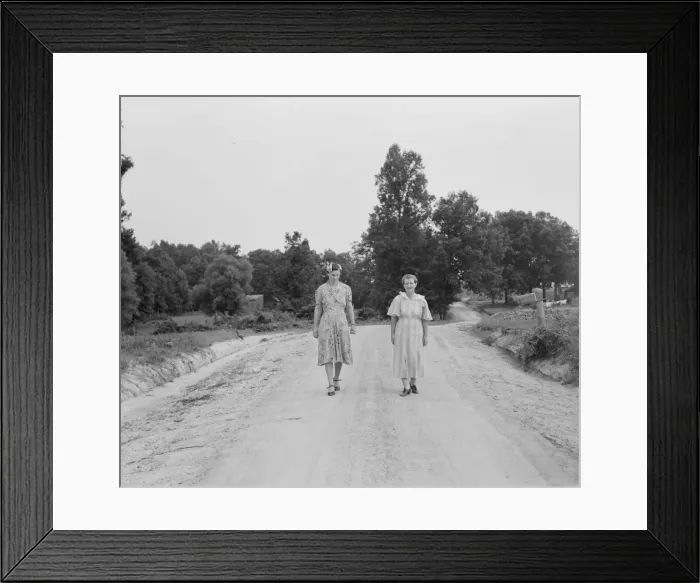 Framed Print : Women walking down the road to see a sick neighbor, Person County, North Carolina, 1939. Creator: Dorothea Lange Framed Print : Women walking down the road to see a sick neighbor, Person County, North Carolina, 1939. Creator: Dorothea Lange
