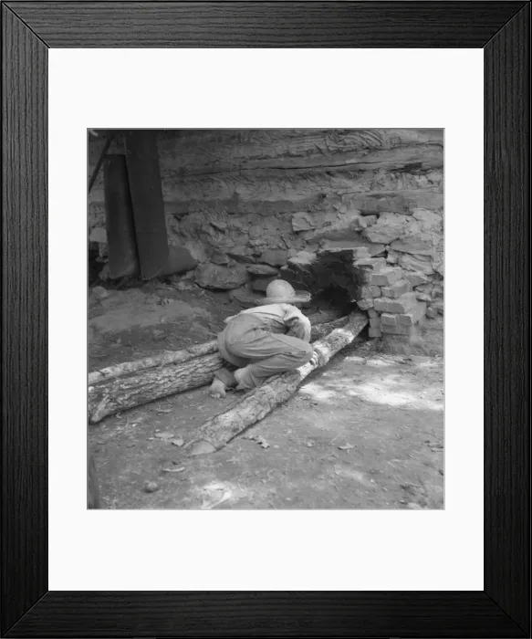Framed Print : Ten year old son of tobacco tenant tends the fire... Granville County, North Carolina, 1939. Creator: Dorothea Lange Framed Print : Ten year old son of tobacco tenant tends the fire... Granville County, North Carolina, 1939. Creator: Dorothea Lange