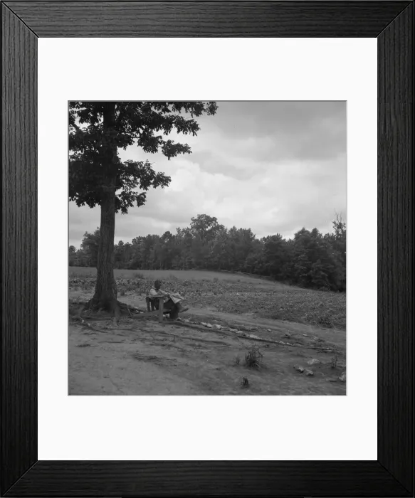 Framed Print : Negro tenant farmer reading paper on a hot Saturday afternoon, Chatham County, North Carolina, 1939. Creator: Dorothea Lange Framed Print : Negro tenant farmer reading paper on a hot Saturday afternoon, Chatham County, North Carolina, 1939. Creator: Dorothea Lange