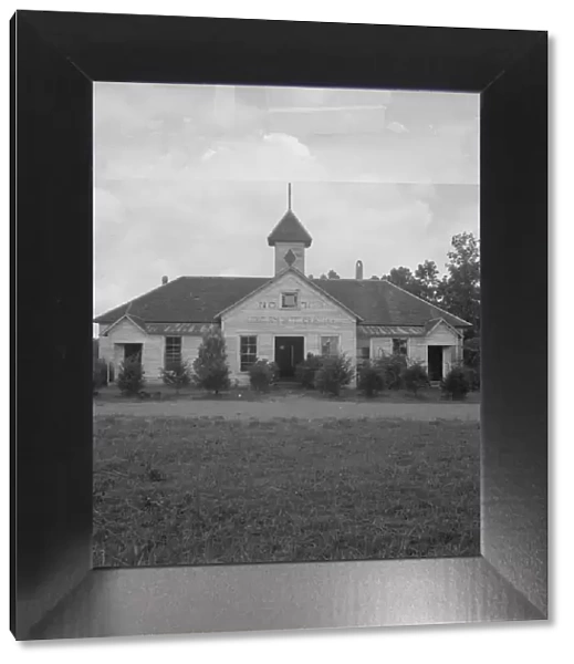 Hickory Mount grange holds its meeting in an old school... Chatham County, North Carolina, 1939. Creator: Dorothea Lange