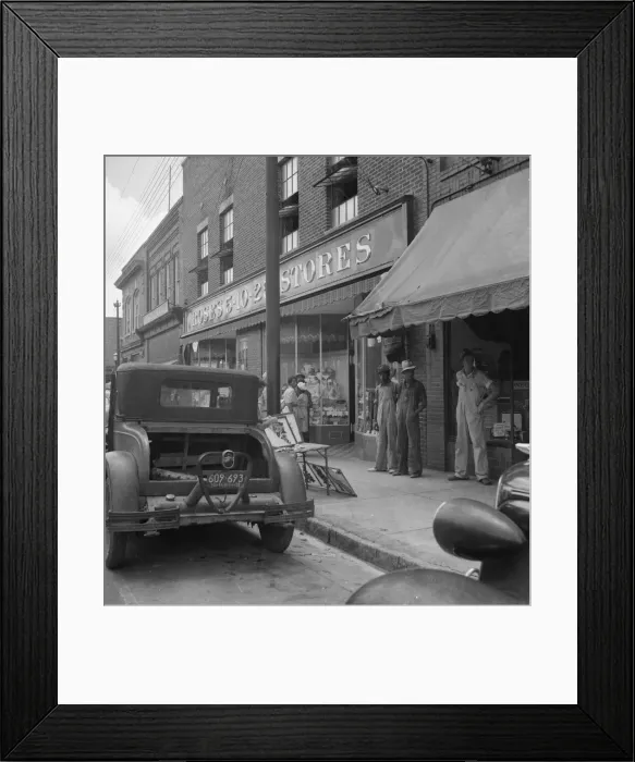 Framed Print : Appliqued embroideries for sale on street in front of ten cent... Siler City, North Carolina, 1939. Creator: Dorothea Lange Framed Print : Appliqued embroideries for sale on street in front of ten cent... Siler City, North Carolina, 1939. Creator: Dorothea Lange