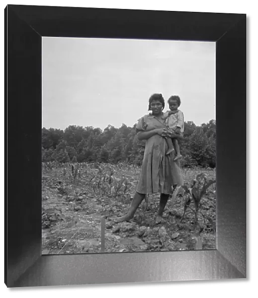 Wife and child of young sharecropper... Hillside Farm, Person County, North Carolina, 1939. Creator: Dorothea Lange