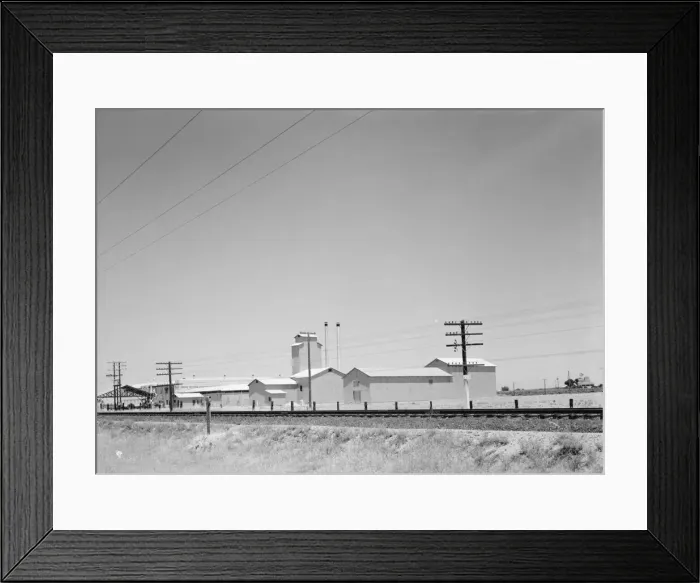 Framed Print : Winery belonging to Muscat Cooperative, on US 99. between Tulare and Fresno, California, 1939. Creator: Dorothea Lange Framed Print : Winery belonging to Muscat Cooperative, on US 99. between Tulare and Fresno, California, 1939. Creator: Dorothea Lange