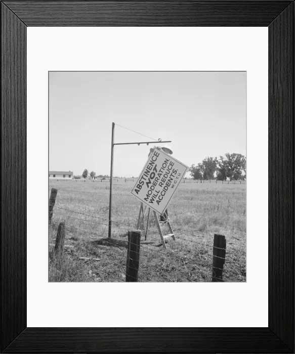 Framed Print : Member of the committee... erects sign on the highway, U.S. 99, near Hanford, CA, 1939. Creator: Dorothea Lange Framed Print : Member of the committee... erects sign on the highway, U.S. 99, near Hanford, CA, 1939. Creator: Dorothea Lange