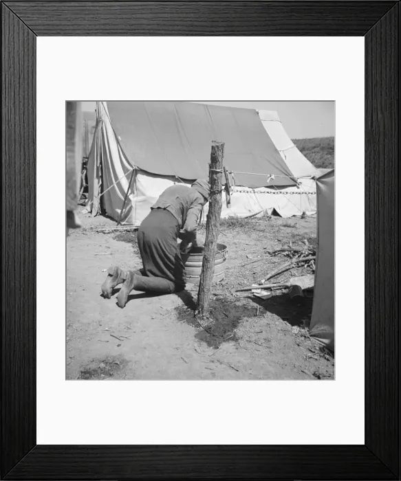 Framed Print : A grandmother washing clothes in California, in a contractors camp near Westley, California, 1939. Creator: Dorothea Lange