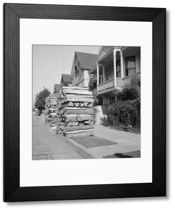 Framed Print : Woodpiles along the street are a characteristic of Portland, Oregon, 1939. Creator: Dorothea Lange Framed Print : Woodpiles along the street are a characteristic of Portland, Oregon, 1939. Creator: Dorothea Lange