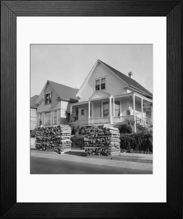 Framed Print : Woodpiles along the street are a characteristic of Portland, Oregon, 1939. Creator: Dorothea Lange Framed Print : Woodpiles along the street are a characteristic of Portland, Oregon, 1939. Creator: Dorothea Lange
