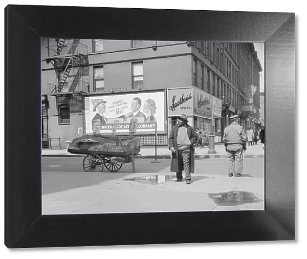A Harlem street scene, New York, 1943. Creator: Gordon Parks