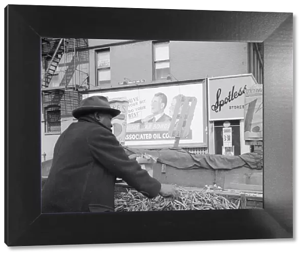Street peddler in the Harlem section, New York, 1943. Creator: Gordon Parks