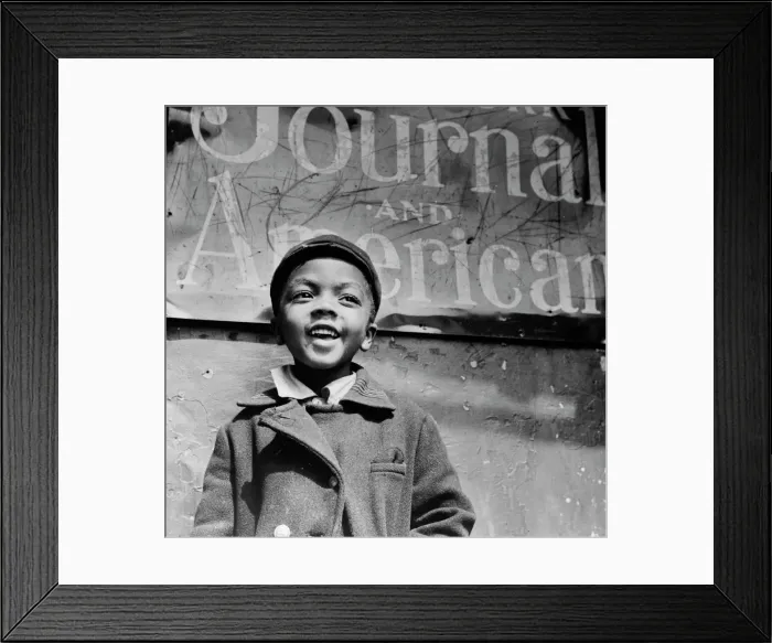 Framed Print : Harlem newsboy, New York, 1943. Creator: Gordon Parks