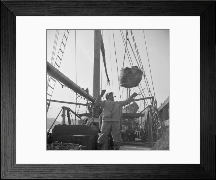 Framed Print : Dock stevedores at the Fulton fish market sending up baskets of fish from the... New York, 1943. Creator: Gordon Parks Framed Print : Dock stevedores at the Fulton fish market sending up baskets of fish from the... New York, 1943. Creator: Gordon Parks