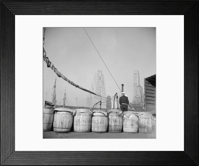Framed Print : Barrels of fish on the docks at Fulton fish market ready to be shipped to... New York, 1943. Creator: Gordon Parks
