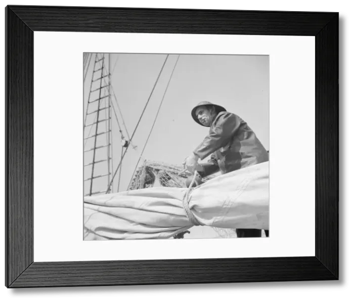 Framed Print : A New England fisherman preparing his boat to leave the New York docks, 1943. Creator: Gordon Parks Framed Print : A New England fisherman preparing his boat to leave the New York docks, 1943. Creator: Gordon Parks